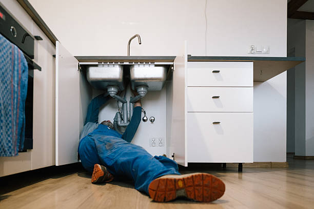 Professional Emergency Plumber technician working in Nassawadox, VA